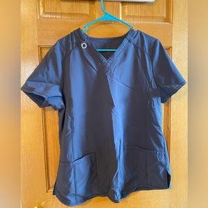 In great shape gently used scrubs. Gray and from a smoke free home